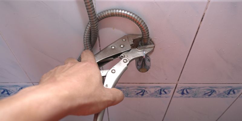 Plumber Repairing Fixture